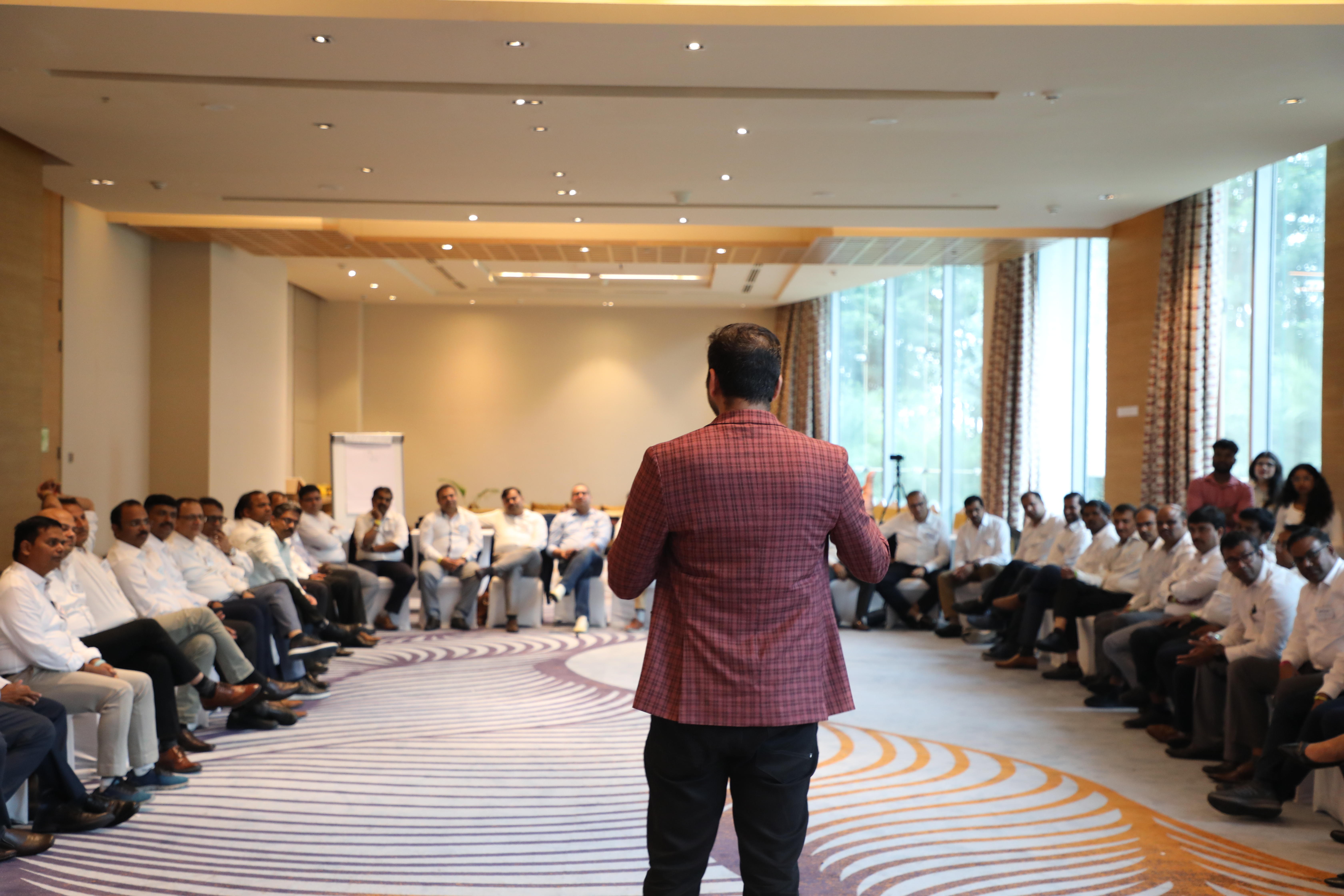 Saveen Hegde leading an immersive workshop room